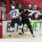 
              Ottawa Senators left wing Brady Tkachuk (7) clashes with St. Louis Blues defenseman Niko Mikkola (77) during the second period of an NHL hockey game Tuesday, Feb. 15, 2022, in Ottawa, Ontario. (Justin Tang/The Canadian Press via AP)
            