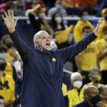 
              Michigan acting head coach Phil Martelli shouts to his players during the first half of an NCAA college basketball game against Illinois Sunday, Feb. 27, 2022, in Ann Arbor, Mich. (AP Photo/Duane Burleson)
            