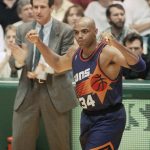 
              FILE - Phoenix' s Charles Barkley celebrates as his coach Paul Westphal cheers him on as they rolled to a 104-97 victory over the SuperSonics at Seattle, May 28, 1993. (AP Photo/Bill Chan, File)
            
