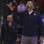 
              Michigan head coach Juwan Howard reacts during the first half of an NCAA college basketball game against Wisconsin, Sunday, Feb. 20, 2022, in Madison, Wis. (Mark Hoffman/Milwaukee Journal-Sentinel via AP)
            