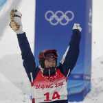 
              United State's Jaelin Kauf celebrates during the award ceremony after winning a silver medal in the women's moguls final at Genting Snow Park at the 2022 Winter Olympics, Sunday, Feb. 6, 2022, in Zhangjiakou, China. (AP Photo/Gregory Bull)
            