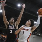 
              Gonzaga guard Andrew Nembhard (3) defends against Pepperdine guard Mike Mitchell Jr. (1) during the first half of an NCAA college basketball game Wednesday, Feb. 16, 2022, in Malibu, Calif. (AP Photo/John McCoy)
            