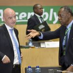 
              FILE - Issa Hayatou, right, speaks to FIFA President Gianni Infantino, left, at the opening of the general assembly of the Confederation of African Football (CAF) in Addis Ababa, Ethiopia, Thursday, March 16, 2017. Long-time African soccer leader Issa Hayatou won an appeal ruling Saturday, Feb. 5, 2022, to overturn a one-year ban for alleged commercial wrongdoing imposed by FIFA where he was once interim president. The Court of Arbitration for Sport said it upheld Hayatou's appeal because “there was insufficient evidence” of misconduct in a Confederation of African Football marketing and media rights deal.  (AP Photo, File)
            