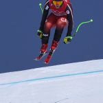
              Brodie Seger, of Canada makes a jump during the downhill part of the men's combined at the 2022 Winter Olympics, Thursday, Feb. 10, 2022, in the Yanqing district of Beijing. (AP Photo/Robert F. Bukaty)
            