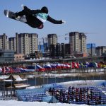
              Synnott Zoi Sadowski of New Zealand competes during the women's snowboard big air qualifications of the 2022 Winter Olympics, Monday, Feb. 14, 2022, in Beijing. (AP Photo/Ashley Landis)
            