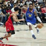 
              Denver Nuggets forward Jeff Green, right, dribbles toward Portland Trail Blazers guard Anfernee Simons during the first half of an NBA basketball game in Portland, Ore., Sunday, Feb. 27, 2022. (AP Photo/Craig Mitchelldyer)
            