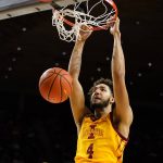 
              Iowa State forward George Conditt IV dunks the ball during the first half of an NCAA college basketball game against Kansas State, Saturday, Feb. 12, 2022, in Ames, Iowa. (AP Photo/Charlie Neibergall)
            