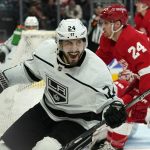 
              Los Angeles Kings center Phillip Danault (24) celebrates his goal against the Detroit Red Wings in the third period of an NHL hockey game Wednesday, Feb. 2, 2022, in Detroit. (AP Photo/Paul Sancya)
            