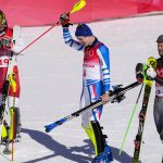 
              From left, Johannes Strolz, of Austria, Clement Noel, of France, Sebastian Foss-Solevaag, of Norway, celebrate after finishing the men's slalom run 2 at the 2022 Winter Olympics, Wednesday, Feb. 16, 2022, in the Yanqing district of Beijing. (AP Photo/Pavel Golovkin)
            