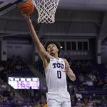 
              TCU guard Micah Peavy (0) goes up for an uncontested shot in the second half of an NCAA college basketball game against West Virginia in Fort Worth, Texas, Monday, Feb. 21, 2022. (AP Photo/Tony Gutierrez)
            