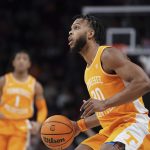 
              Tennessee guard Josiah-Jordan James looks for a shot during the first half of an NCAA college basketball game against South Carolina, Saturday, Feb. 5, 2022, in Columbia, S.C. (AP Photo/Sean Rayford)
            
