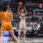 
              Connecticut's Azzi Fudd shoots in the second half of an NCAA college basketball game against Tennessee, Sunday, Feb. 6, 2022, in Hartford, Conn. (AP Photo/Jessica Hill)
            
