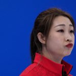 
              China's Zhang Lijun, reacts, during the women's curling match against Switzerland, at the 2022 Winter Olympics, Thursday, Feb. 10, 2022, in Beijing. (AP Photo/Nariman El-Mofty)
            