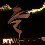 
              The lit Badaling section of the Great Wall of China is seen near the 2022 Winter Olympics logo on the outskirts of Beijing on Feb. 8, 2022. China has thousands of years of doing things in a really big way, reinforcing its perceived place in the world and the political power of its leaders — from emperors to Mao Zedong to Xi Jinping. None of this bigness is new. It goes back to a dozen dynasties that ruled China for thousands of years, a tradition of projecting power that was adopted by the Chinese Communist Party when it came to power in 1949. It could be termed simply: big, bigger and biggest — and then some. (AP Photo/Ng Han Guan)
            