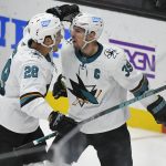 
              San Jose Sharks right wing Timo Meier (28) congratulates Logan Couture (39) on his goal against the Anaheim Ducks during the second period of an NHL hockey game Tuesday, Feb. 22, 2022, in Anaheim, Calif. (AP Photo/John McCoy)
            