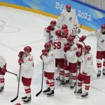 
              The Russian Olympic Committee reacts after losing to Finland in the men's gold medal hockey game at the 2022 Winter Olympics, Sunday, Feb. 20, 2022, in Beijing. (AP Photo/Jae C. Hong)
            