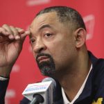 
              Michigan head coach Juwan Howard speaks to the media regarding a fight that broke out on the court after an NCAA college basketball game against Wisconsin in Madison, Wis., Sunday, Feb. 20, 2022. (Amber Arnold/Wisconsin State Journal via AP)
            