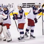 
              Columbus Blue Jackets players congratulate each other after beating the Florida Panthers 6-3 during an NHL hockey game, Thursday, Feb. 24, 2022, in Sunrise, Fla. (AP Photo/Wilfredo Lee)
            