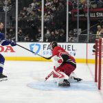 
              Tampa Bay Lightning's Victor Hedman, left, and Carolina Hurricanes goalie Frederik Andersen participate in the Skills Competition save streak event, part of the NHL All-Star weekend, Friday, Feb. 4, 2022, in Las Vegas. (AP Photo/Rick Scuteri)
            