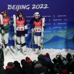 
              From left, Australia's Jakara Anthony, United State's Jaelin Kauf and Anastasiia Smirnva, of the Russian Olympic Committee, pose for pictures after the women's moguls finals at Genting Snow Park at the 2022 Winter Olympics, Sunday, Feb. 6, 2022, in Zhangjiakou, China. (AP Photo/Lee Jin-man)
            