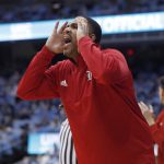 
              Louisville interim head coach Mike Pegues yells to his team during the first half of an NCAA college basketball game against North Carolina in Chapel Hill, N.C., Monday, Feb. 21, 2022. (Ethan Hyman/The News & Observer via AP)
            