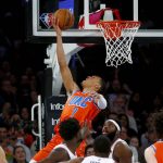 
              Oklahoma City Thunder's Darius Bazley (7) ties the score in the closing seconds of regulation in an NBA basketball game against the New York Knicks on Monday, Feb. 14, 2022, in New York. The Thunder won in overtime, 127-123. AP Photo/John Munson)
            