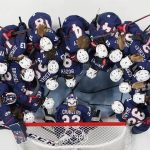 
              United States players gather in front of the net before a women's semifinal hockey game against Finland at the 2022 Winter Olympics, Monday, Feb. 14, 2022, in Beijing. (AP Photo/Petr David Josek)
            