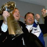 
              FILE -  Dallas Cowboys head coach Jimmy Johnson, right, celebrates with owner Jerry Jones who holds up the Vince Lombardi Trophy after their win over the Buffalo Bills in NFL football's Super Bowl XXVII in Pasadena, Calif., Jan. 31, 1993. (AP Photo/Rick Bowmer, File)
            