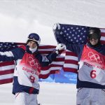 
              Silver medal winner United State's Nick Goepper (9) and Gold medal winner United States' Alexander Hall (6) celebrate after the men's slopestyle finals at the 2022 Winter Olympics, Wednesday, Feb. 16, 2022, in Zhangjiakou, China. (AP Photo/Lee Jin-man)
            