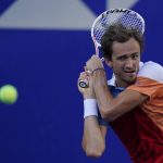 
              Daniil Medvedev of Russia returns a ball during a match against to Yoshihito Nishioka of Japan in the quarterfinal of the Mexican Open tennis tournament in Acapulco, Mexico, Thursday, Feb. 24, 2022. (AP Photo/Eduardo Verdugo)
            