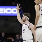 
              Gonzaga forward Drew Timme (2) celebrates his 3-point basket during the first half of the team's NCAA college basketball game against Santa Clara, Saturday, Feb. 19, 2022, in Spokane, Wash. (AP Photo/Young Kwak)
            