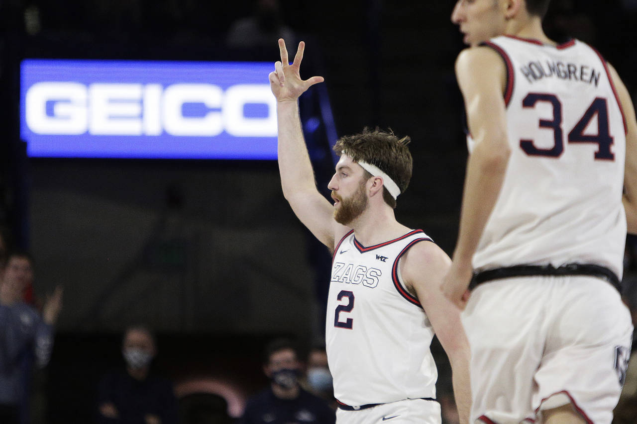 Gonzaga forward Drew Timme (2) celebrates his 3-point basket during the first half of the team's NC...