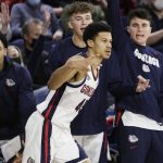 
              Gonzaga guard Rasir Bolton, center, celebrates his basket during the second half of an NCAA college basketball game against Pacific, Thursday, Feb. 10, 2022, in Spokane, Wash. (AP Photo/Young Kwak)
            