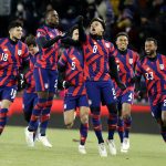
              United States' Weston McKennie (8) celebrates a goal with teammates Kellyn Acosta (23), Reggie Cannon (4), Antonee Robinson (5), Tim Weah, (21) and Ricardo Pepi (18) during the first half of the team's FIFA World Cup qualifying soccer match against Honduras, Wednesday, Feb. 2, 2022, in St. Paul, Minn. (AP Photo/Andy Clayton-King)
            
