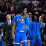 
              UCLA guard Tyger Campbell pauses on the court during the second half of the team's NCAA college basketball game against Arizona State on Saturday, Feb. 5, 2022, in Tempe, Ariz. Arizona State won 87-84 in three overtimes. (AP Photo/Ross D. Franklin)
            