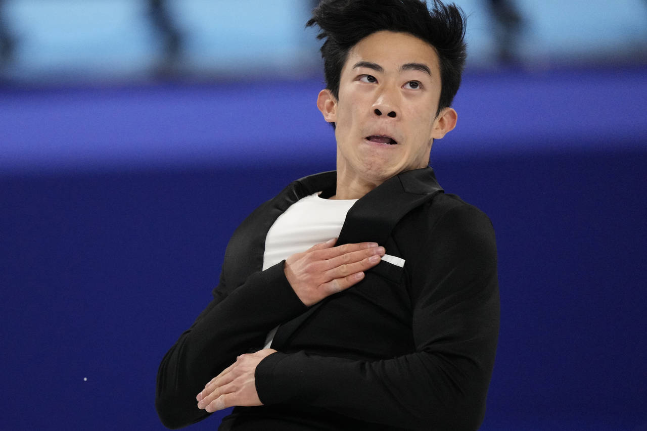Nathan Chen, of the United States, competes during the men's short program figure skating competiti...