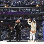 
              Eminem, from left, performs with Kendrick Lamar, Dr. Dre, Mary J. Blige and Snoop Dogg during halftime of the NFL Super Bowl 56 football game between the Los Angeles Rams and the Cincinnati Bengals Sunday, Feb. 13, 2022, in Inglewood, Calif. (AP Photo/Chris O'Meara)
            