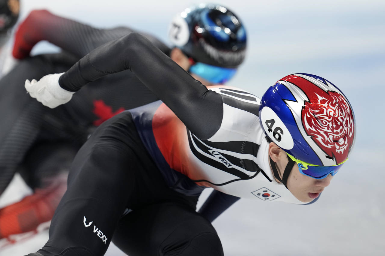Lee Juneseo of South Korea races in his heat of the men's 1,000-meter during the short track speeds...