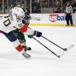 
              Florida Panthers right wing Patric Hornqvist (70) shoots under pressure from Minnesota Wild defenseman Jonas Brodin (25) in the second period of an NHL hockey game Friday, Feb. 18, 2022, in St. Paul, Minn. (AP Photo/Andy Clayton-King)
            