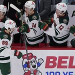 
              Minnesota Wild center Frederick Gaudreau (89) celebrates with teammates after scoring a goal against the Chicago Blackhawks during the second period of an NHL hockey game in Chicago, Wednesday, Feb. 2, 2022. (AP Photo/Nam Y. Huh)
            