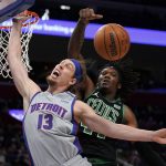 
              Boston Celtics center Robert Williams III (44) blocks a Detroit Pistons forward Kelly Olynyk (13) shot in the second half of an NBA basketball game in Detroit, Friday, Feb. 4, 2022. (AP Photo/Paul Sancya)
            