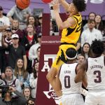 
              Missouri forward Trevon Brazile (23) dunks against Texas A&M during the second half of an NCAA college basketball game, Saturday, Feb. 5, 2022, in College Station, Texas. (AP Photo/Sam Craft)
            
