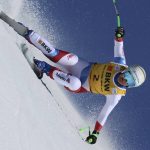 
              Switzerland's Priska Nufer speeds down the course during an alpine ski, women's World Cup downhill race, in Crans Montana, Switzerland, Sunday, Feb. 27, 2022. (AP Photo/Marco Trovati)
            