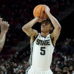 
              Michigan State guard Max Christie shoots a basket against Maryland during the first half of an NCAA college basketball game, Tuesday, Feb. 1, 2022, in College Park, Md. (AP Photo/Julio Cortez)
            