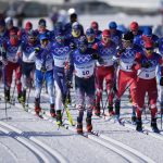 
              Athletes compete during the men's 15km + 15km skiathlon cross-country skiing competition at the 2022 Winter Olympics, Sunday, Feb. 6, 2022, in Zhangjiakou, China. (AP Photo/Alessandra Tarantino)
            