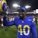
              Los Angeles Rams outside linebacker Von Miller (40) celebrates after the team defeatdd the Tampa Bay Buccaneers during an NFL divisional round playoff football game Sunday, Jan. 23, 2022, in Tampa, Fla. (AP Photo/Jason Behnken)
            
