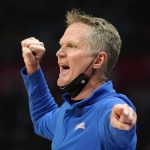 
              Golden State Warriors head coach Steve Kerr gestures to his team during the first half of an NBA basketball game Monday, Feb. 14, 2022, in Los Angeles. (AP Photo/Mark J. Terrill)
            