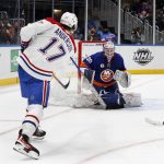 
              Ilya Sorokin (30) of the New York Islanders surrenders a goal late during the second period against Josh Anderson (17) of the Montreal Canadiens at UBS Arena on Sunday, Feb. 20, 2022 in Elmont, New York./Newsday via AP)
            