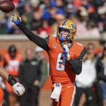 
              National Team quarterback Kenny Pickett, of Pittsburgh, throws a pass during the first half of an NCAA Senior Bowl college football game, Saturday, Feb. 5, 2022, in Mobile, Ala. (AP Photo/Butch Dill)
            