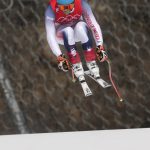 
              FILE - Ryan Cochran-Siegle of the United States makes a jump during men's downhill training at the 2022 Winter Olympics, Friday, Feb. 4, 2022, in the Yanqing district of Beijing. Fifty years after his mom, Barbara Ann, won the gold in slalom, Cochran-Siegle is contending for a medal in the men's downhill that will open the Alpine skiing program of the Beijing Games on Sunday. (AP Photo/Luca Bruno, File)
            